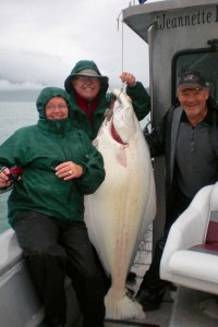 Vicky and Art with Guide Larry caught a nice HOG Halibut