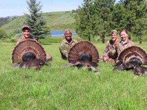 Group: Abby, Tyler, Terry, and Ryan with 2025 Tom Turkeys